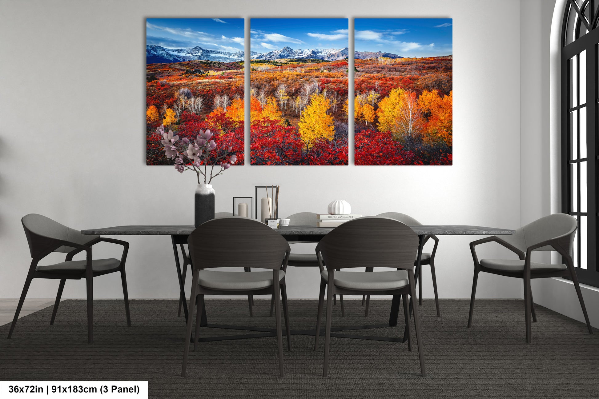 a dining room with a table and four chairs