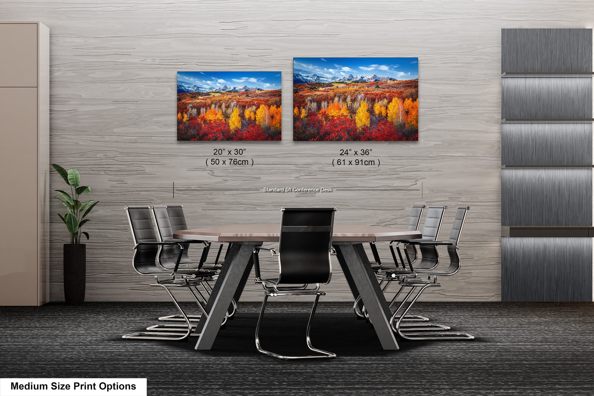 a dining room table with chairs and paintings on the wall