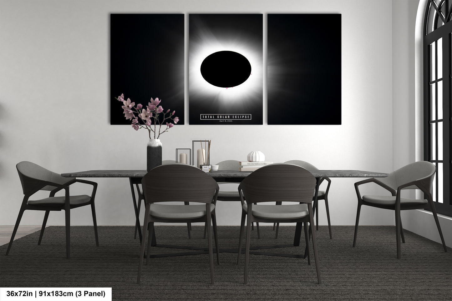 a black and white photo of a dining room