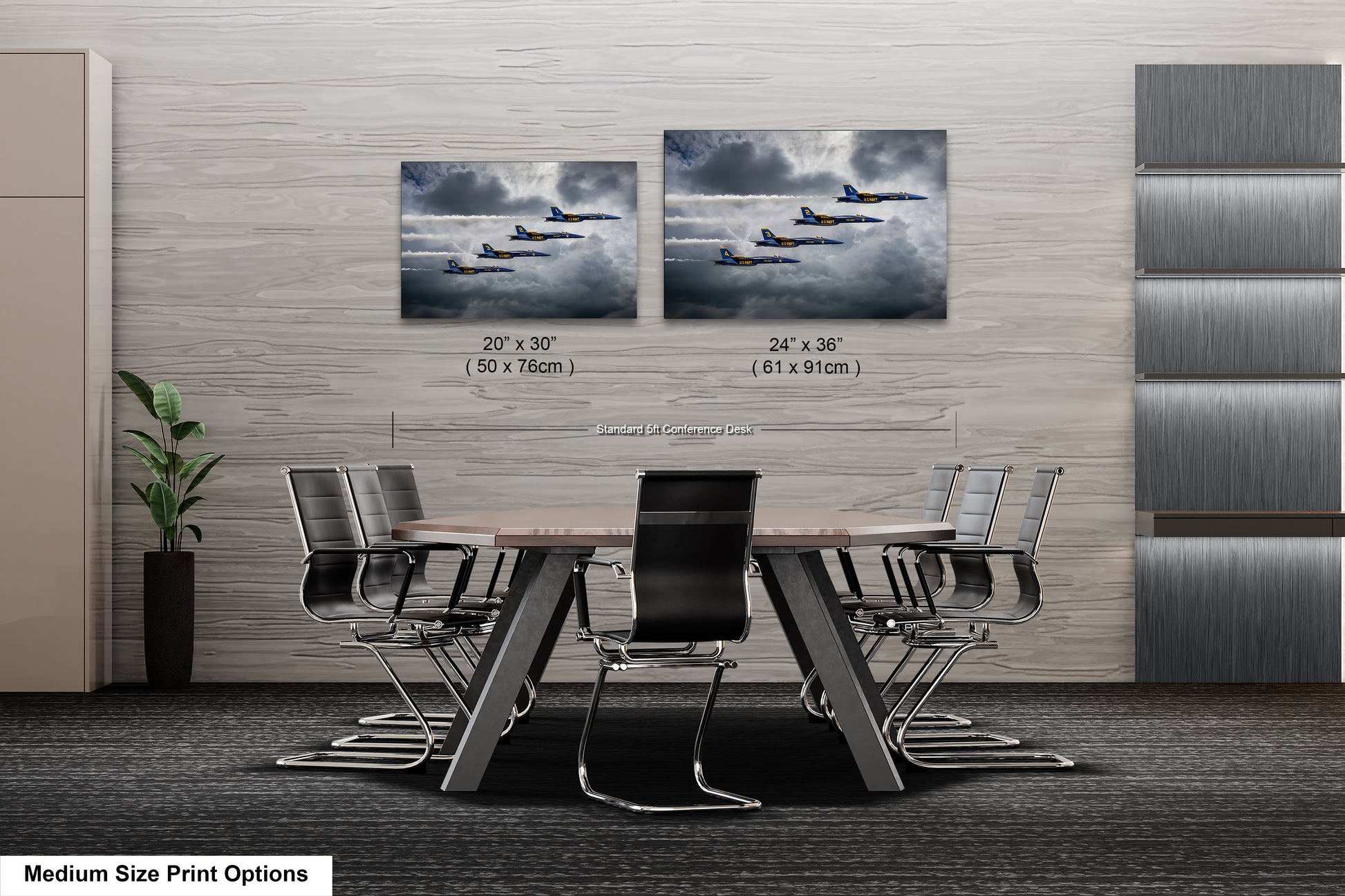 a dining room table with four chairs and two pictures on the wall