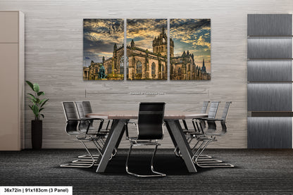 a dining room table with chairs and a painting on the wall