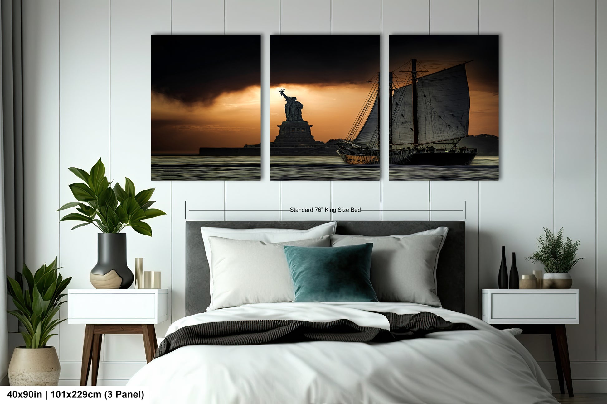 a picture of a bed with a statue of liberty in the background