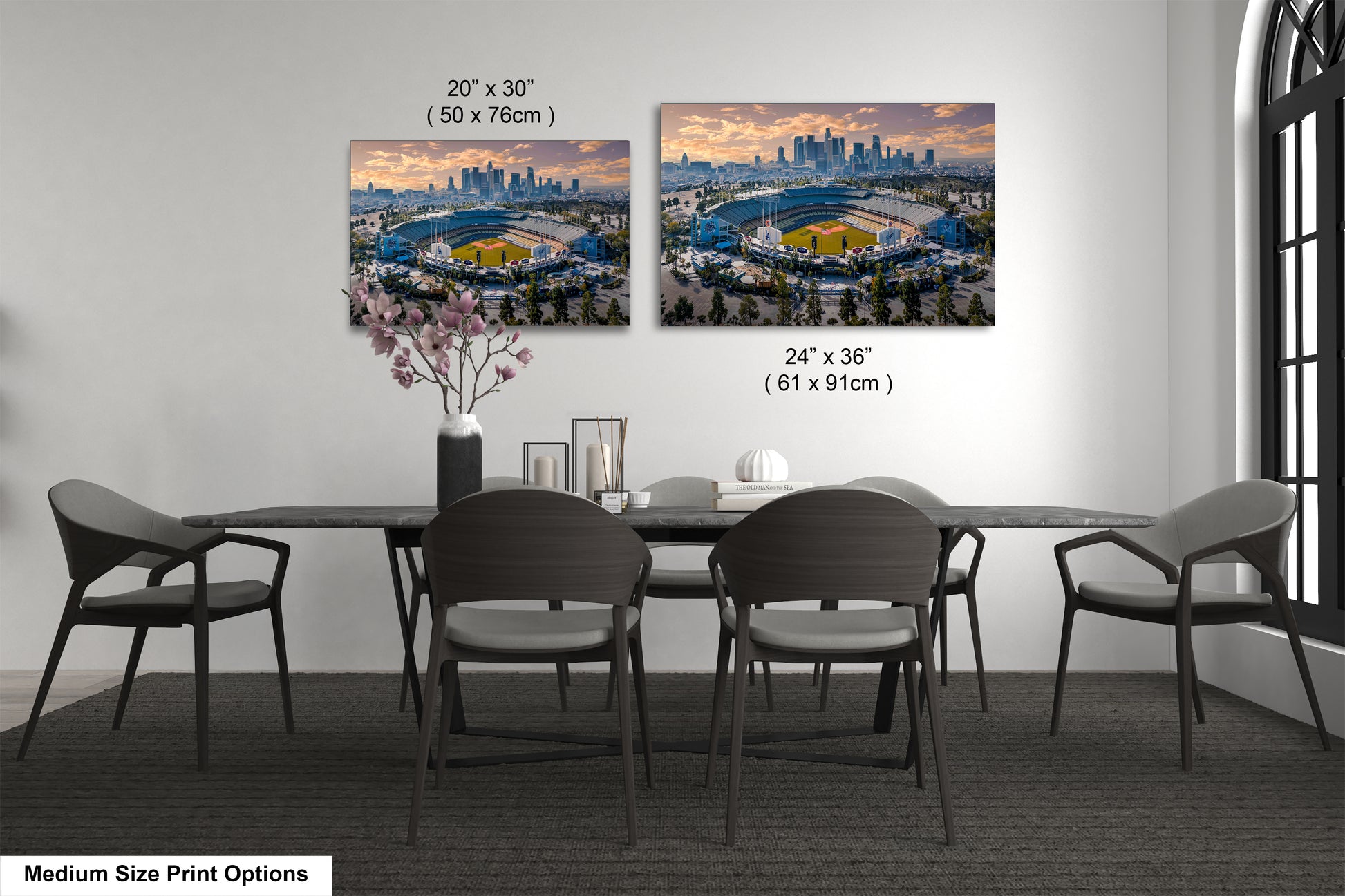 a dining room table with chairs and a vase of flowers