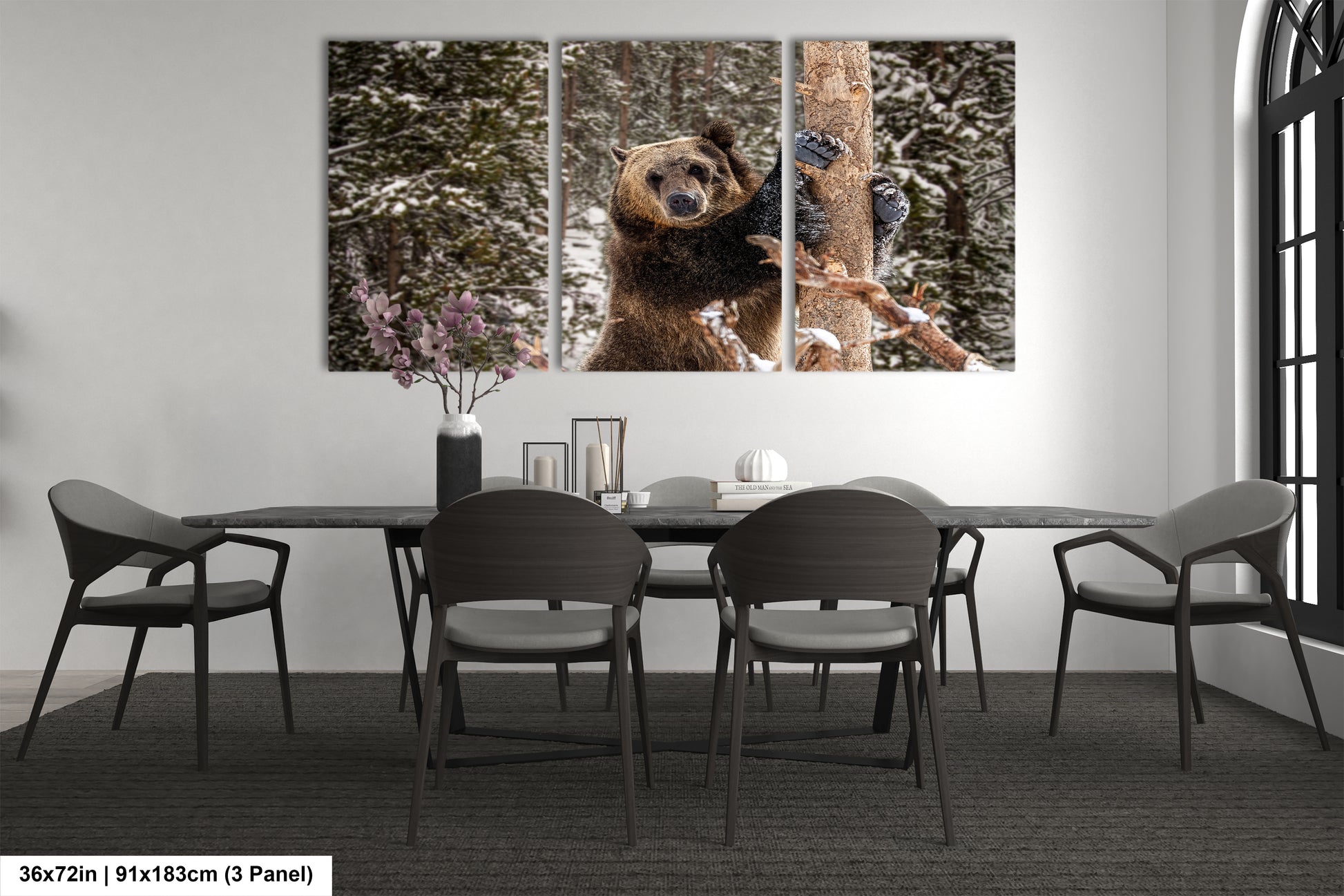 a dining room table with chairs and a bear on it