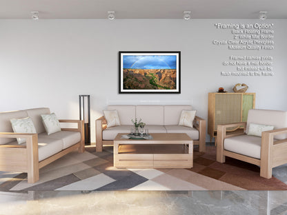 a living room filled with furniture and a painting on the wall
