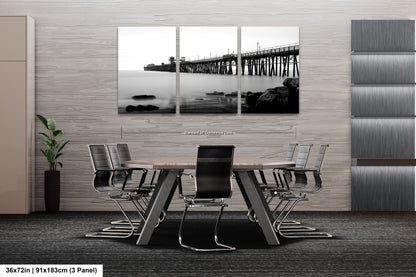 a dining room with a table and chairs