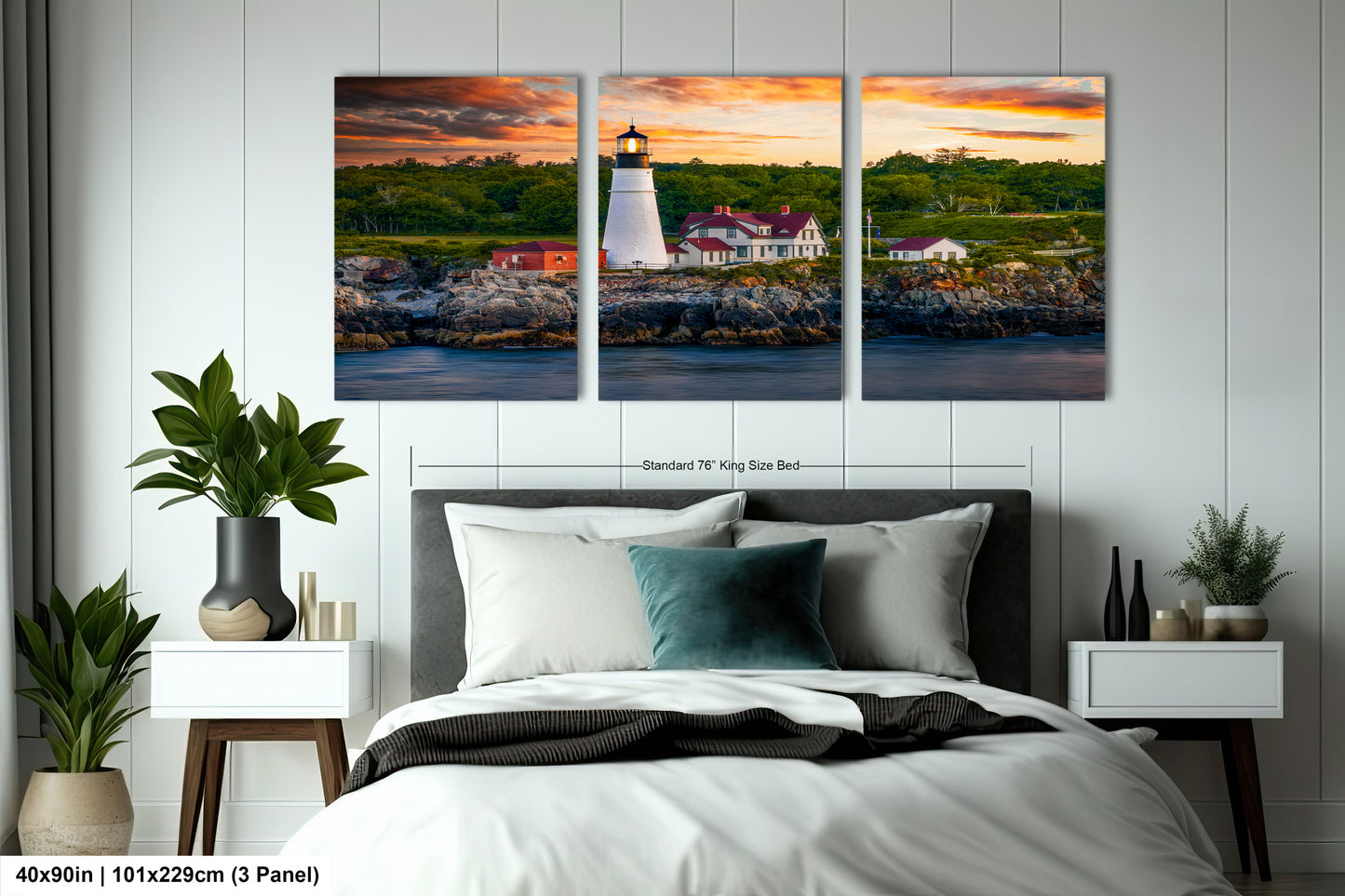 a bedroom with a bed and two paintings on the wall
