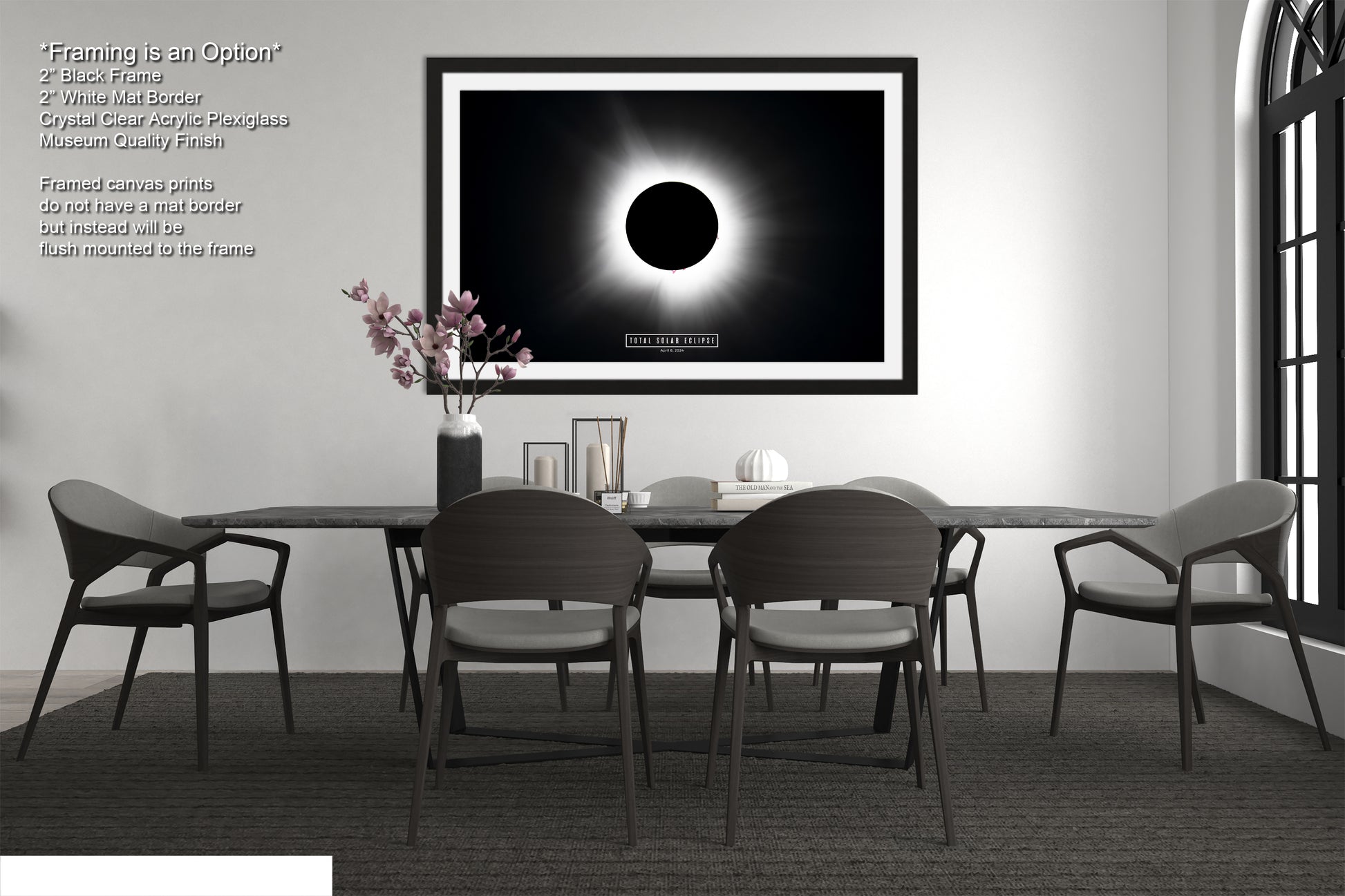 a black and white photo of a dining room