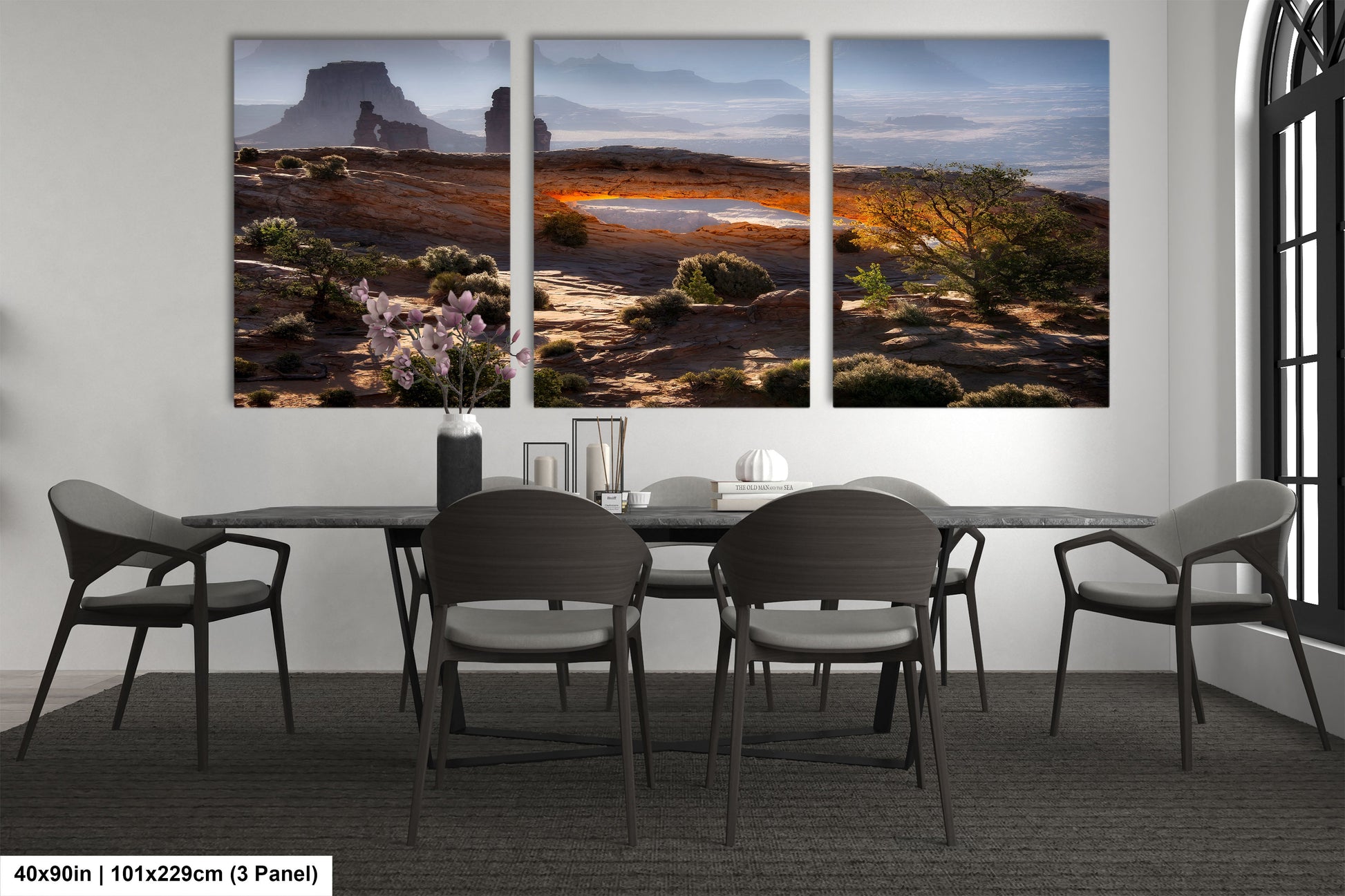 a dining room with a table and four chairs