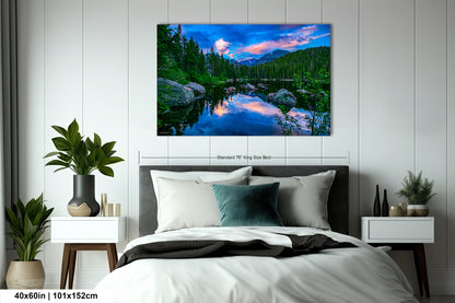 a bedroom with a bed and a painting on the wall