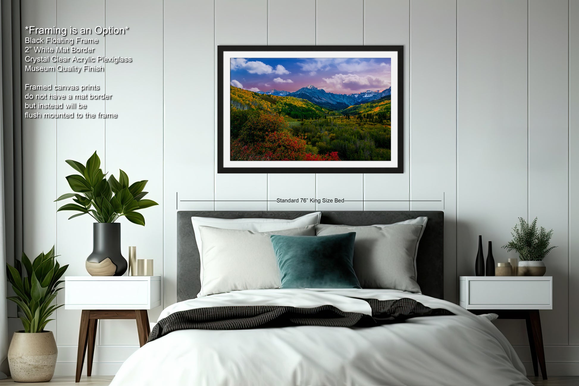 a bedroom with a large bed and a picture on the wall