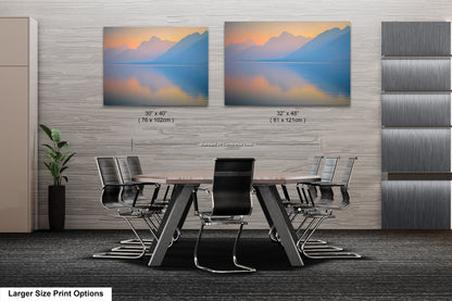 a dining room table with chairs in front of it