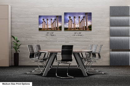 a dining room table with chairs next to a wall