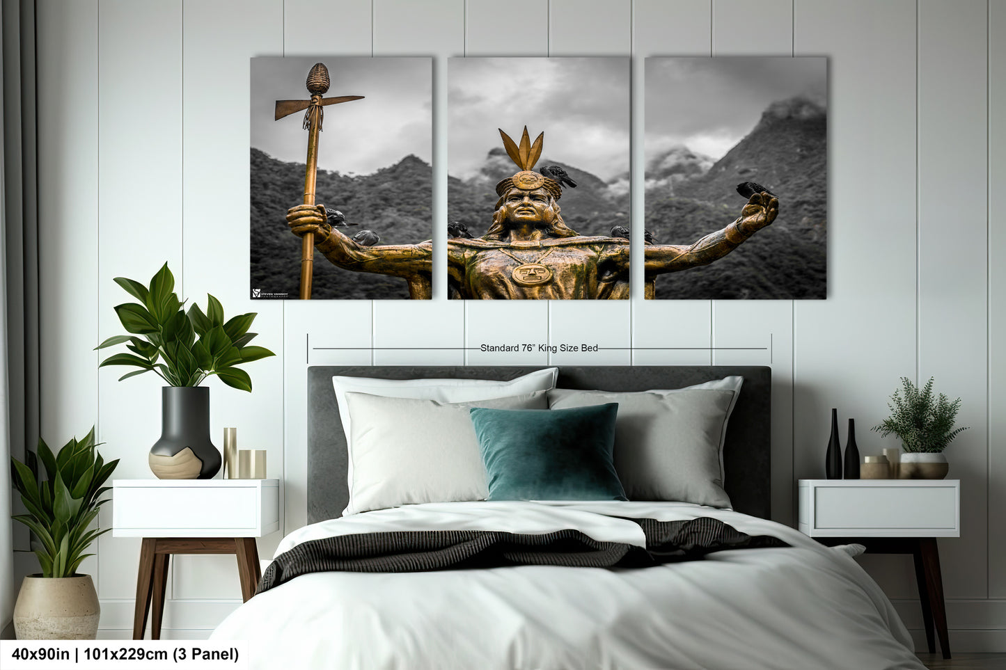 a bed room with a neatly made bed and paintings on the wall