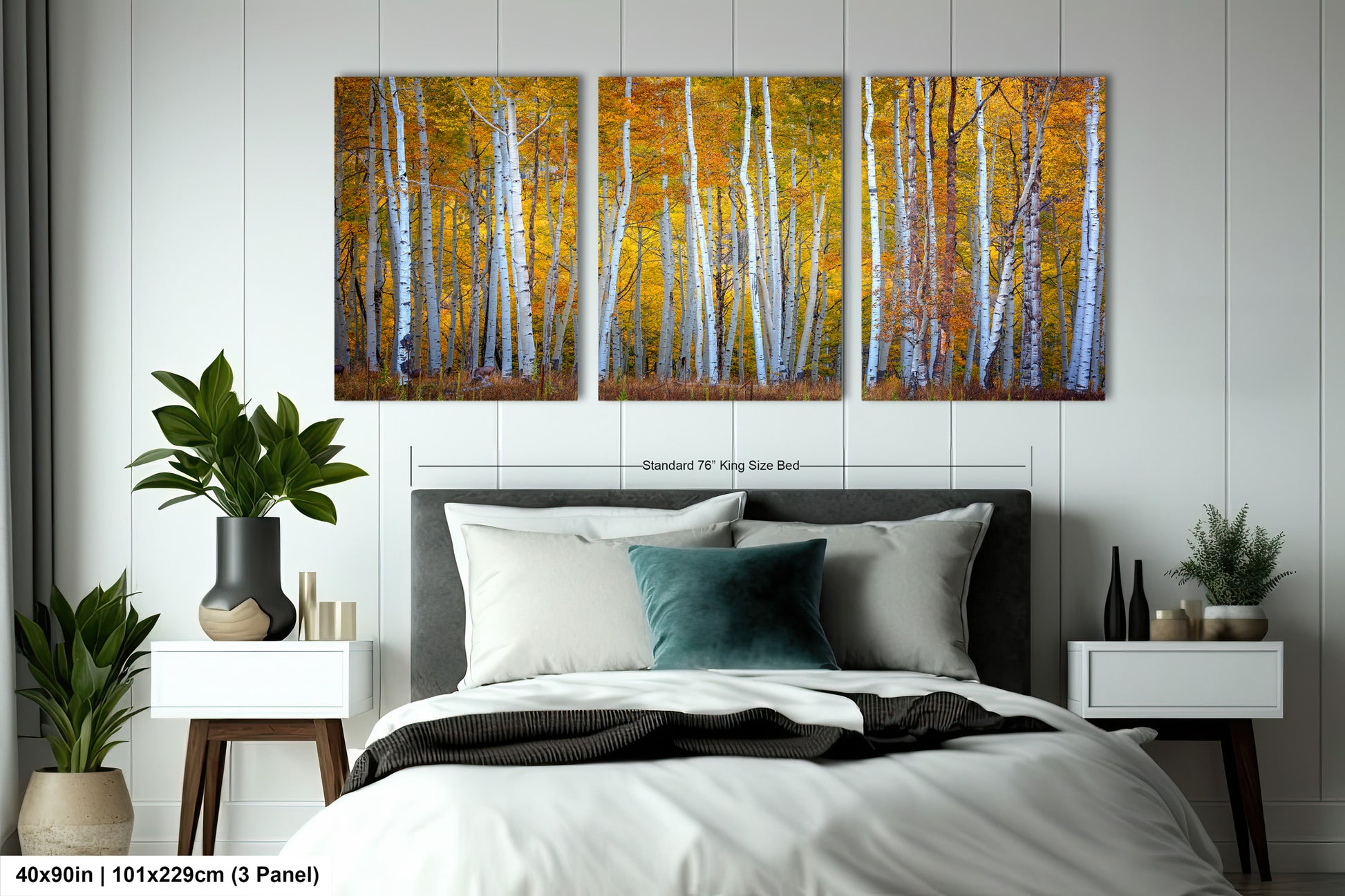 a bedroom with a bed and paintings on the wall