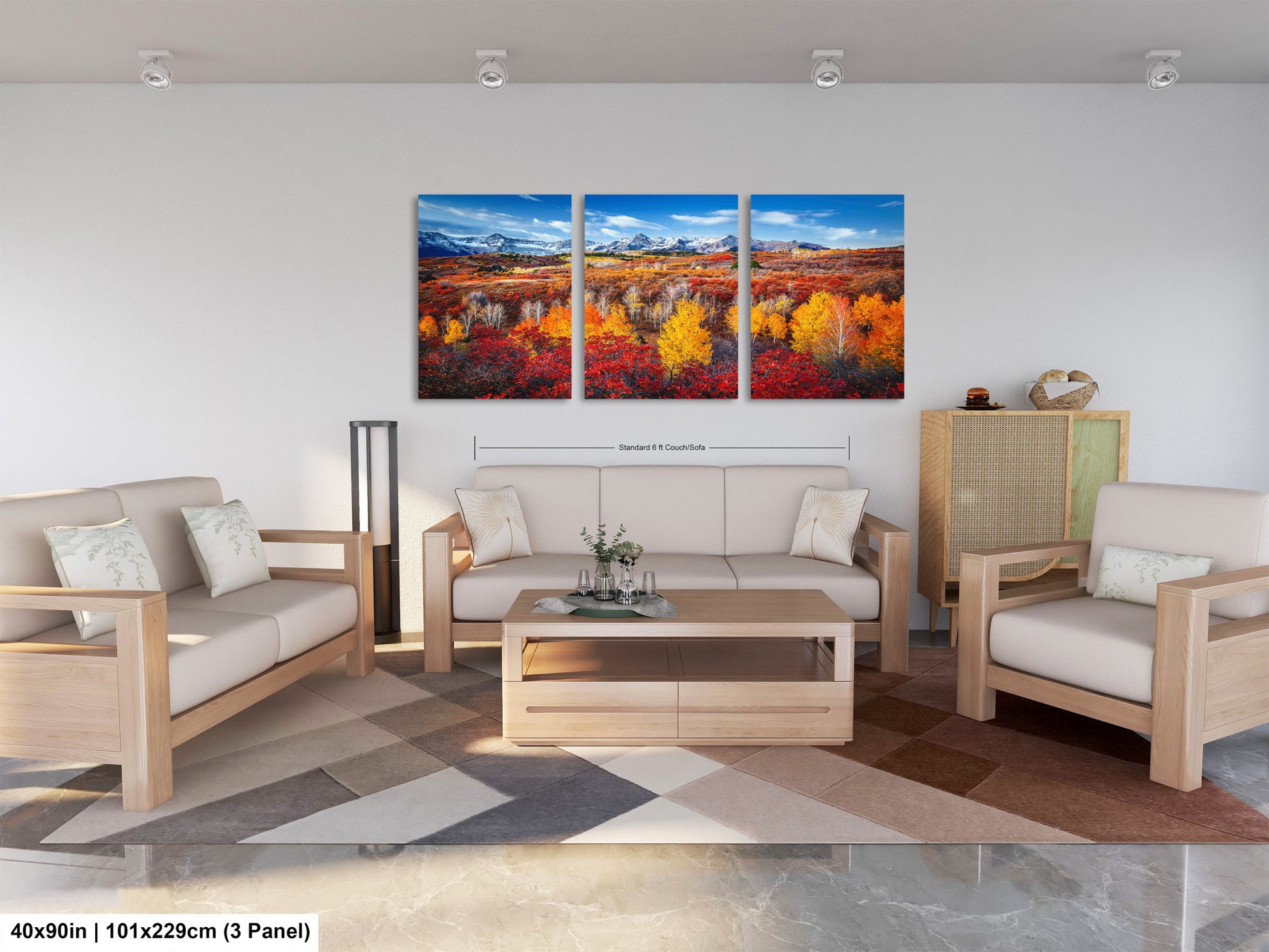 a living room filled with furniture and paintings on the wall