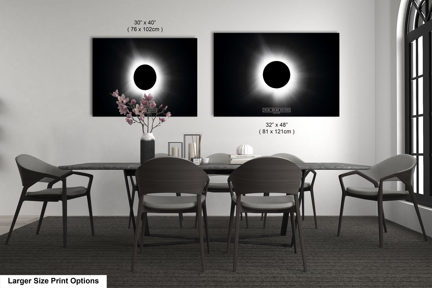 a black and white photo of a dining room