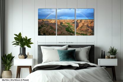 a bed room with a neatly made bed and two pictures on the wall