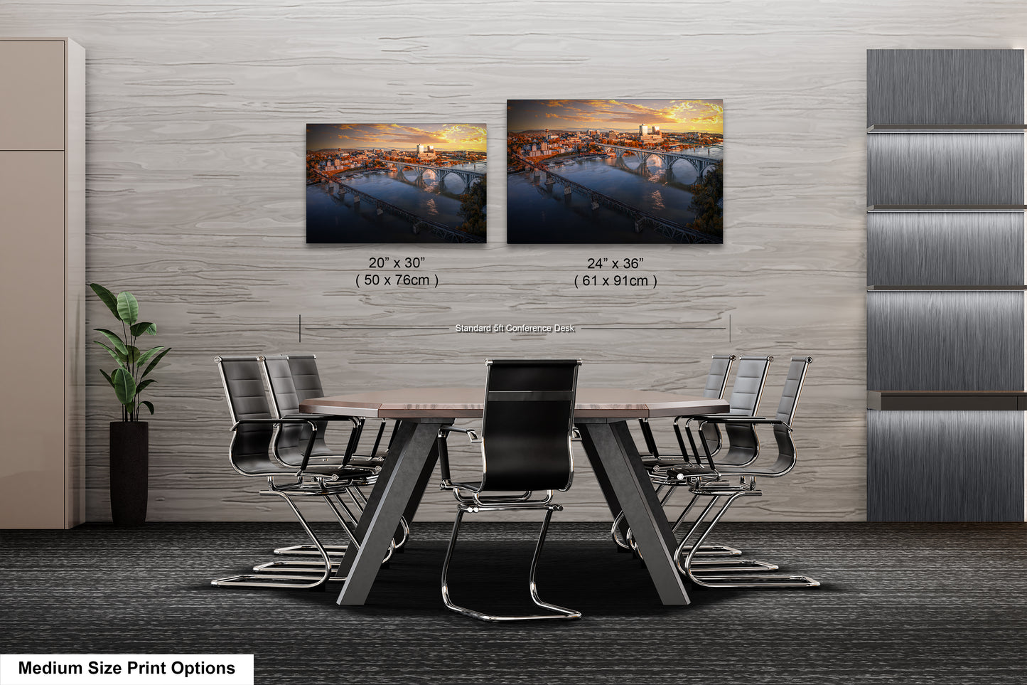 a dining room table with four chairs and two pictures on the wall