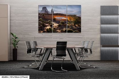 a dining room with a table and chairs