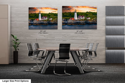two paintings of a lighthouse on a wall above a table