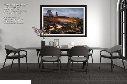 a picture of a dining room with a table and chairs