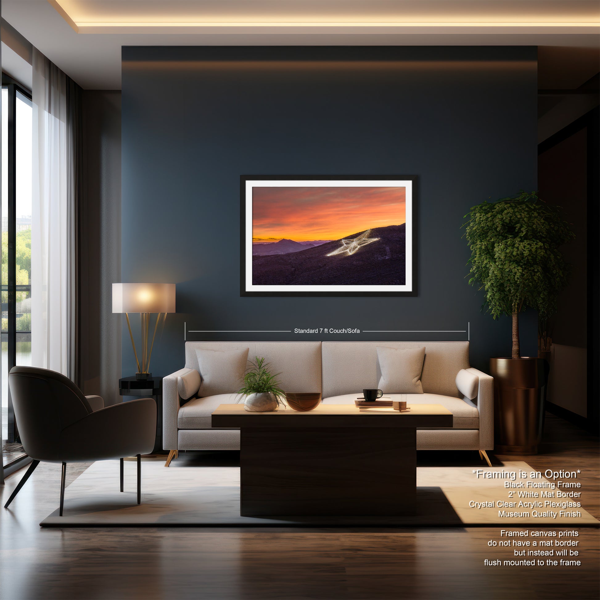 a living room filled with furniture and a painting on the wall