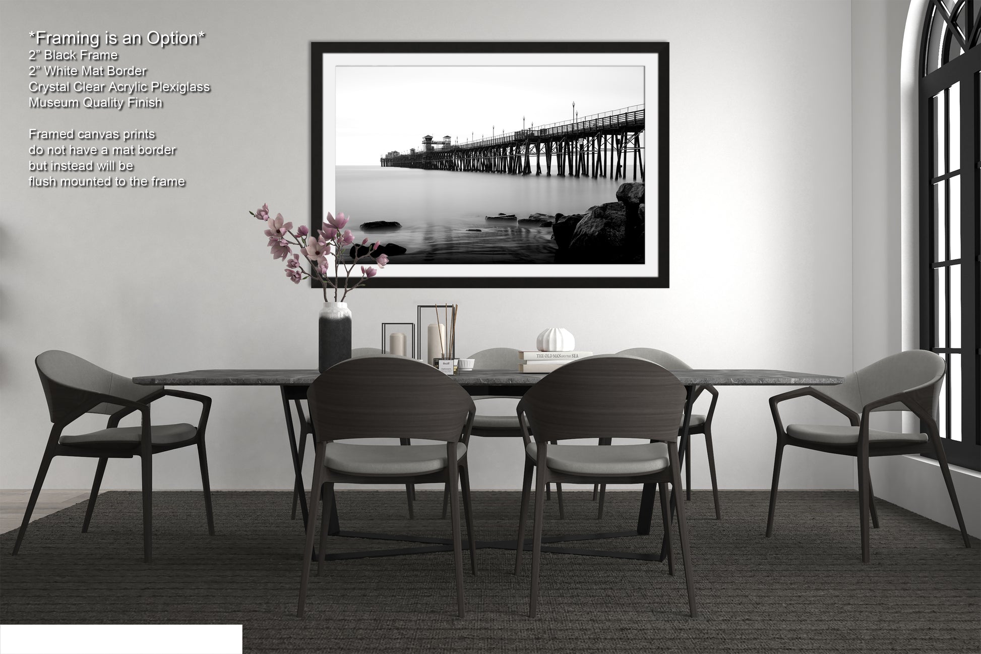 a black and white photo of a table and chairs