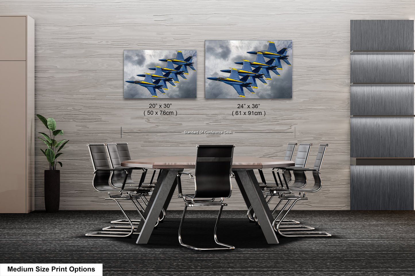 a dining room table with four chairs and two pictures of planes on the wall