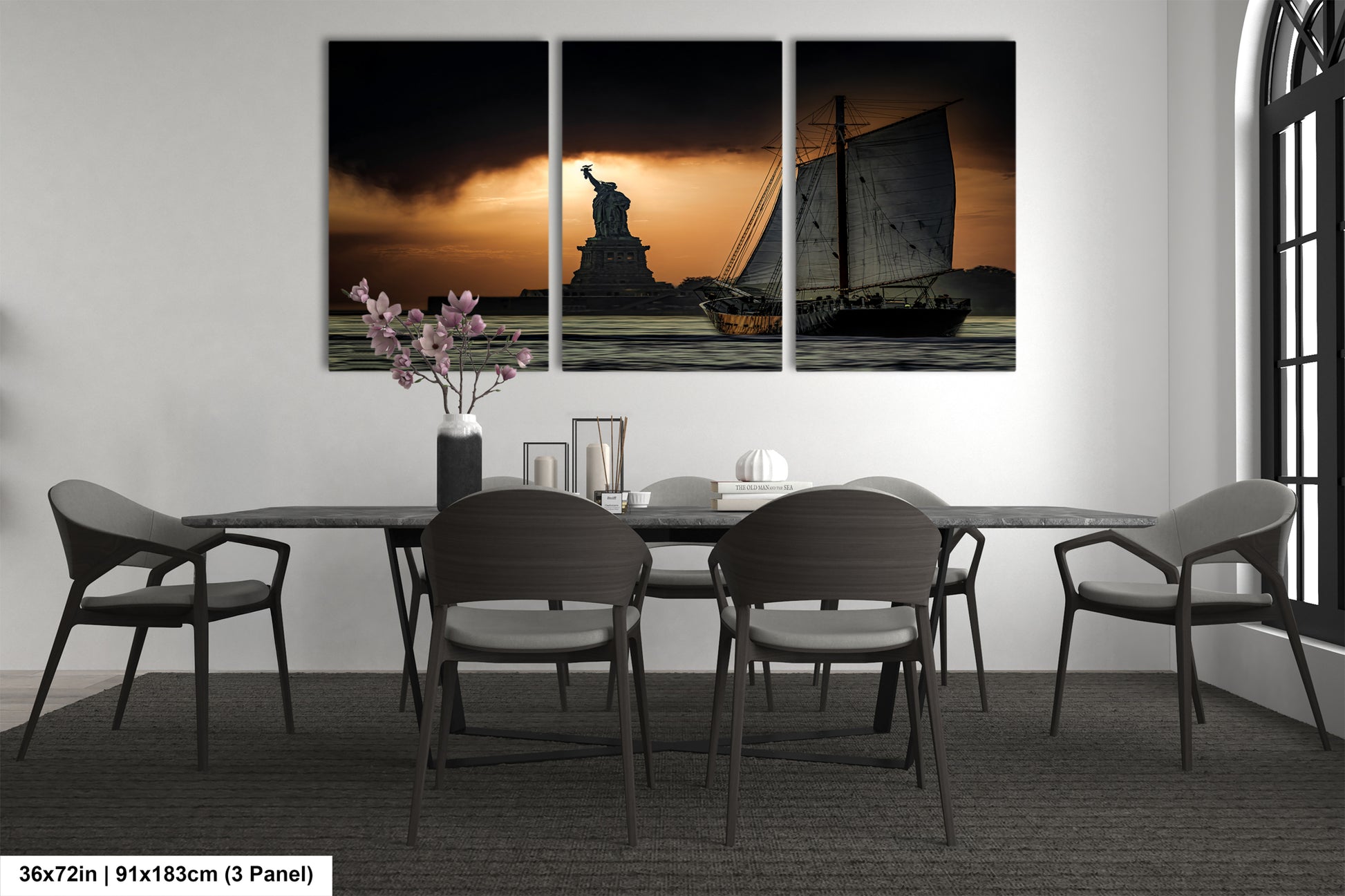 a dining room table with chairs and a picture of the statue of liberty on it