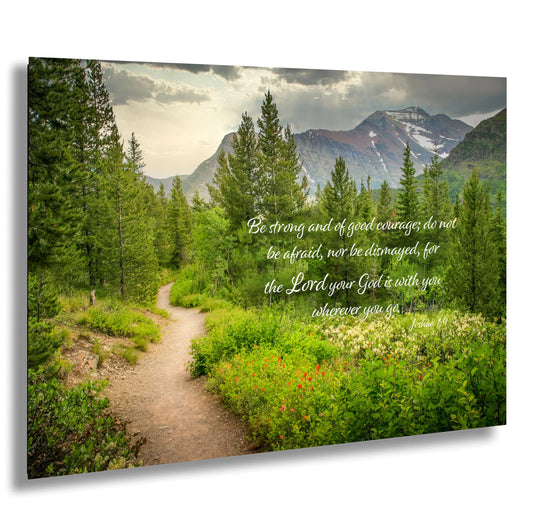 a path leading through a forest with a bible verse on it