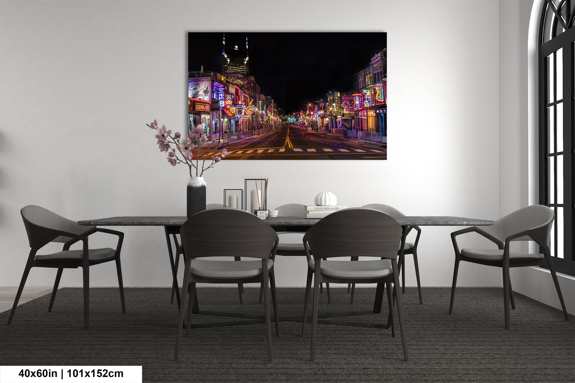 a painting of a city street at night