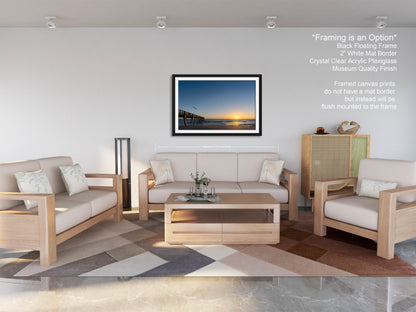 a living room filled with furniture and a painting on the wall