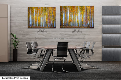 a dining room table with chairs and a painting on the wall