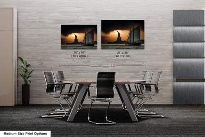 a dining room table with chairs and a picture of a woman
