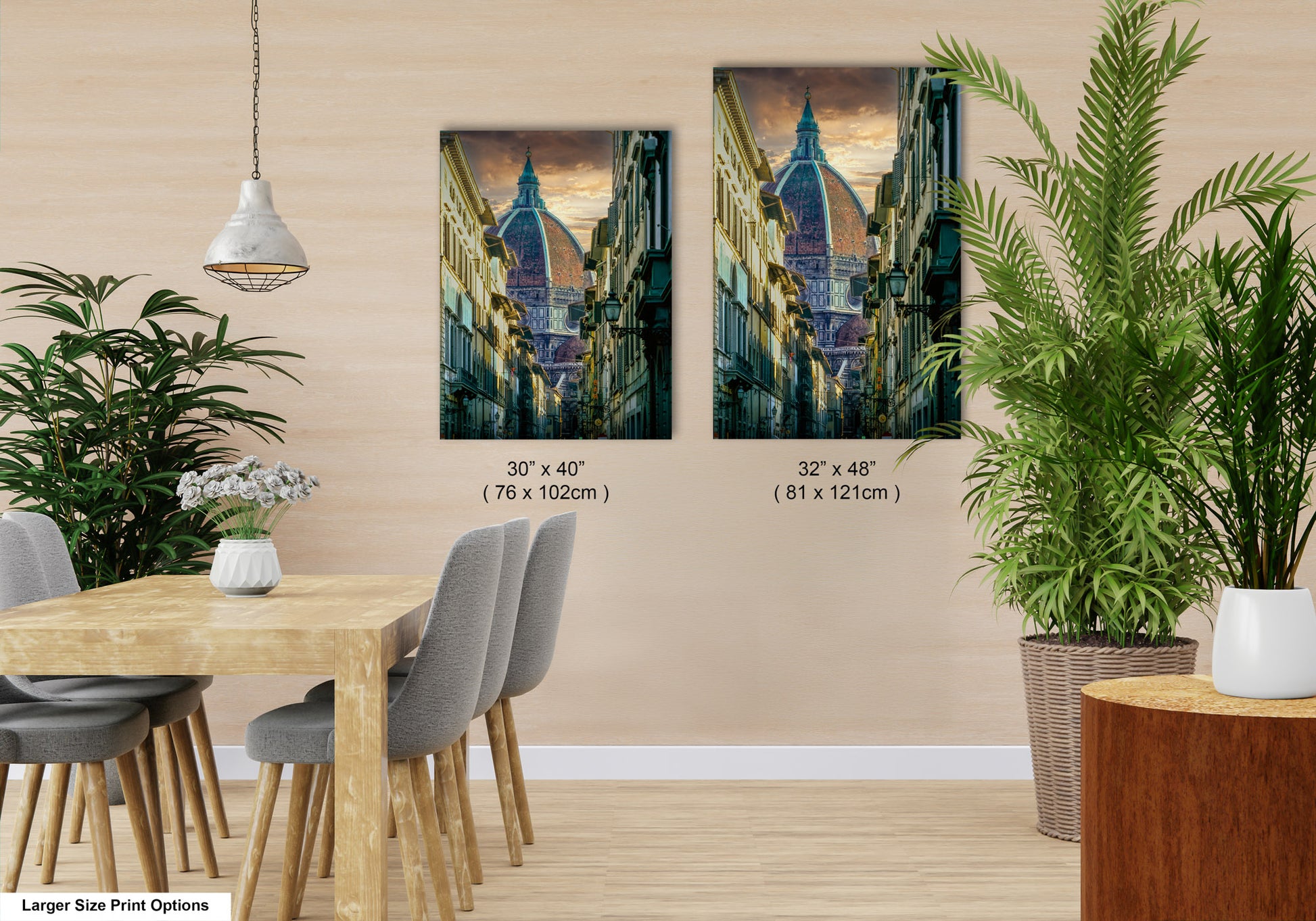 a dining room with a table and chairs next to a potted plant