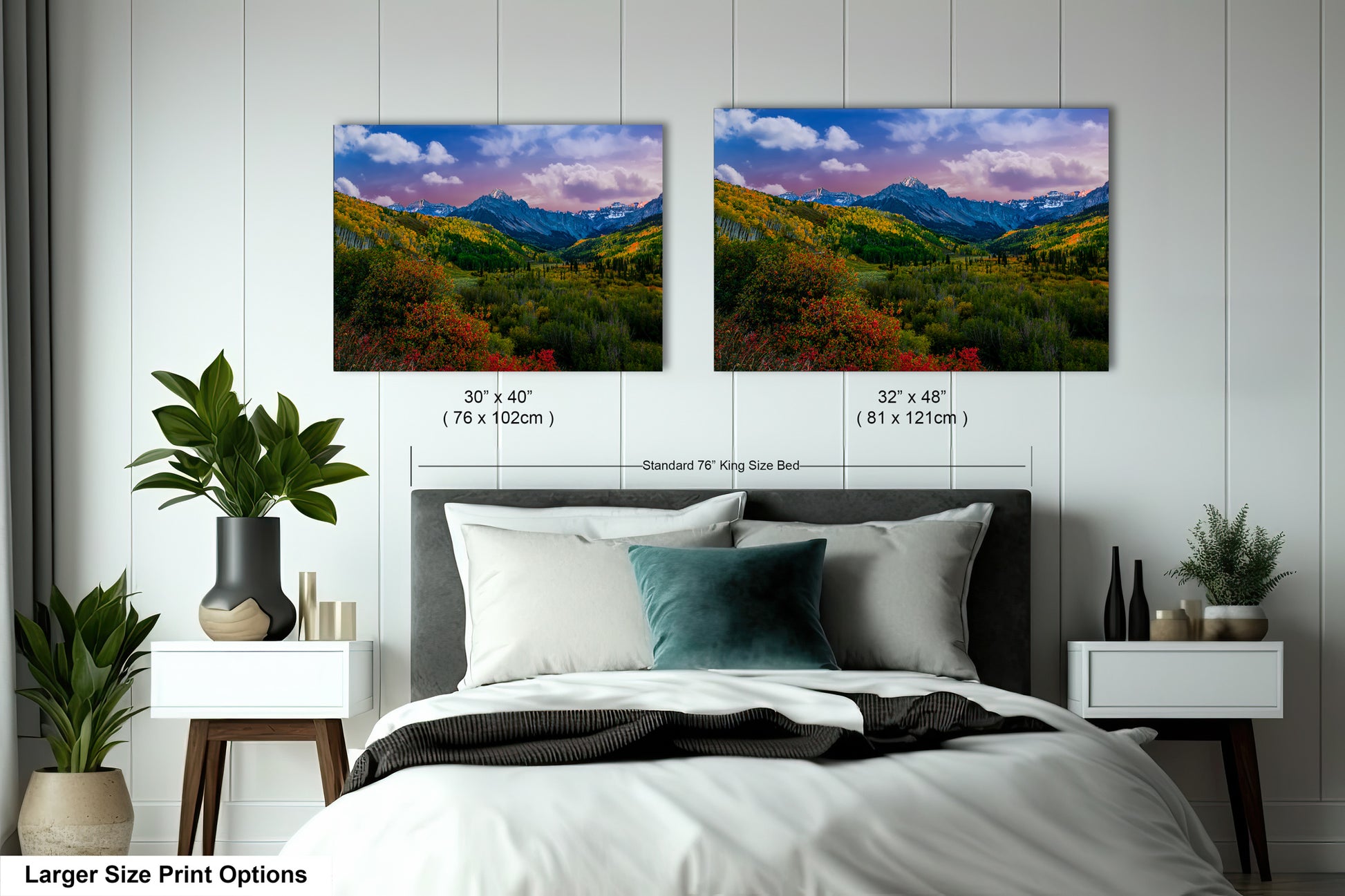 a bedroom with a bed and two pictures on the wall