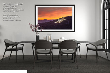 a picture of a dining room with a table and chairs