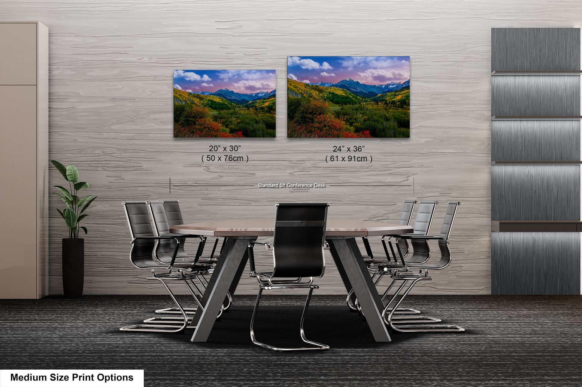 a dining room table with chairs and a wall hanging