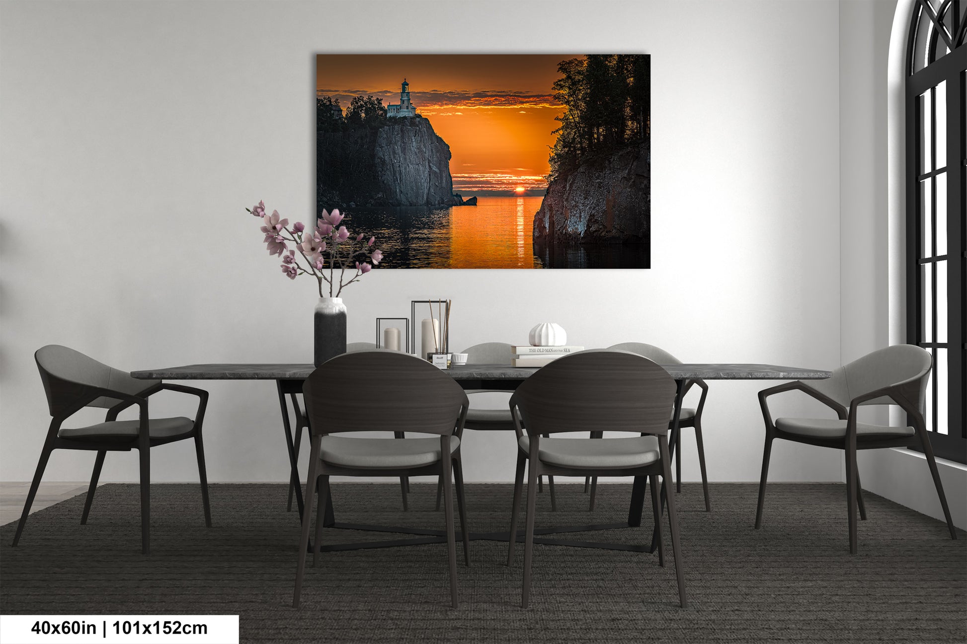 a dining room with a table and chairs