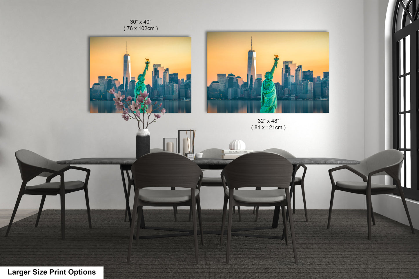 a dining room table with four chairs and a picture of the statue of liberty