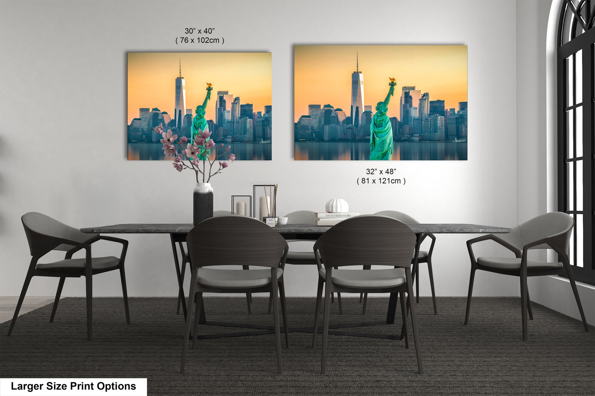 a dining room table with four chairs and a picture of the statue of liberty