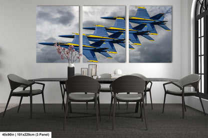 a dining room table with four blue and yellow fighter jets on it