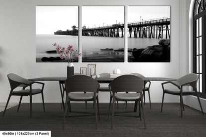 a black and white photo of a dining room