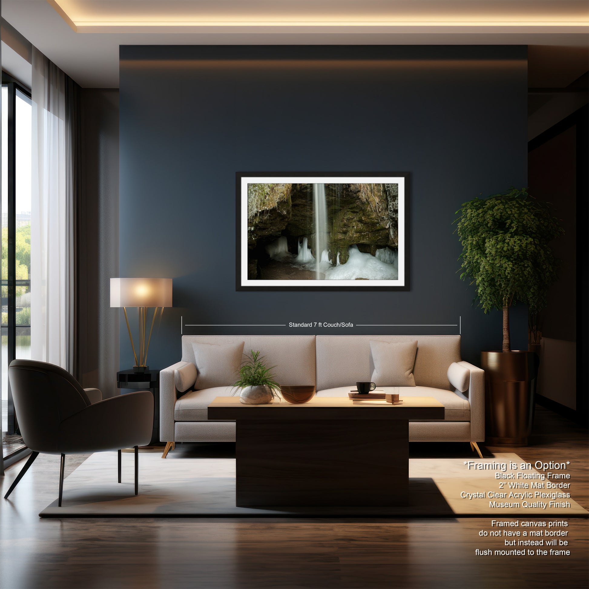 a living room with a couch a chair and a painting on the wall