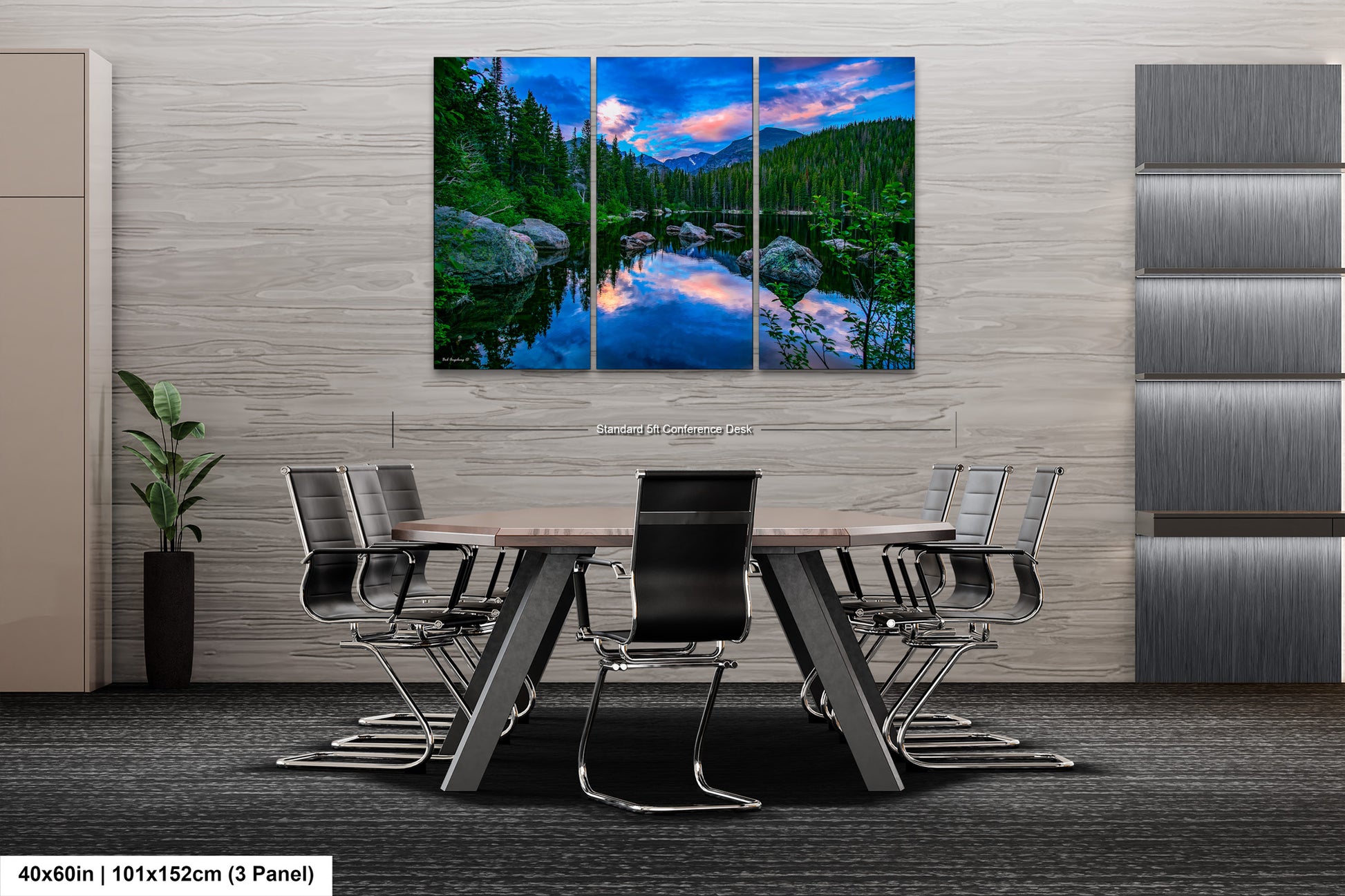 a dining room table with chairs and a painting on the wall