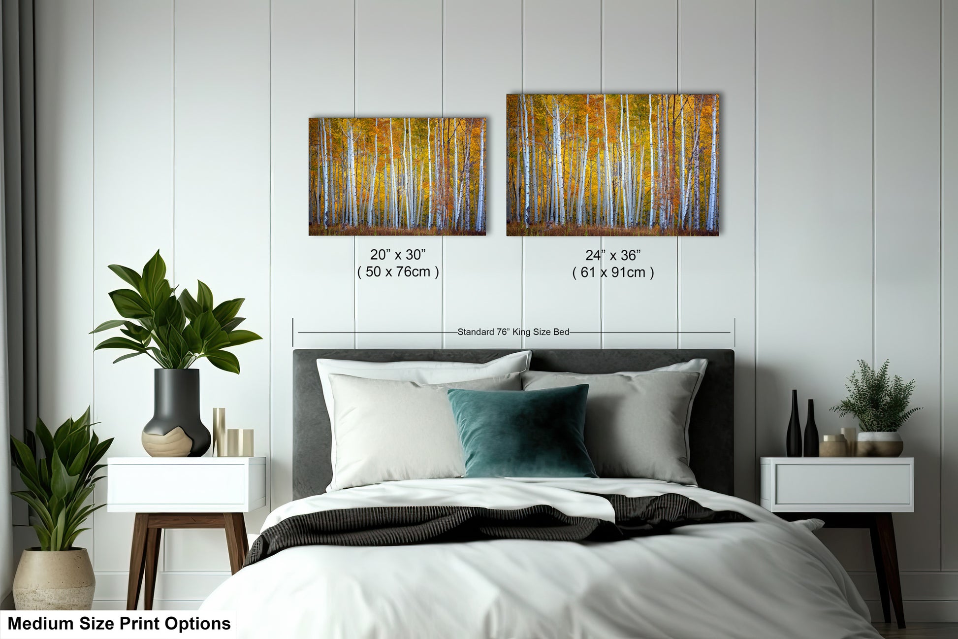 a bed room with a neatly made bed and two paintings on the wall