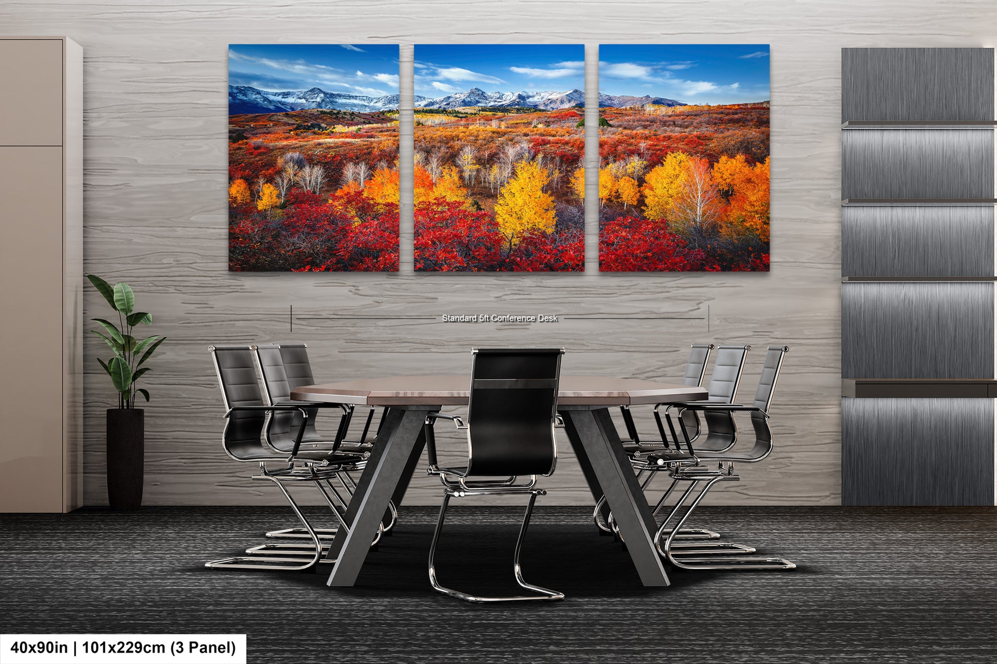 a dining room table with chairs and a painting on the wall