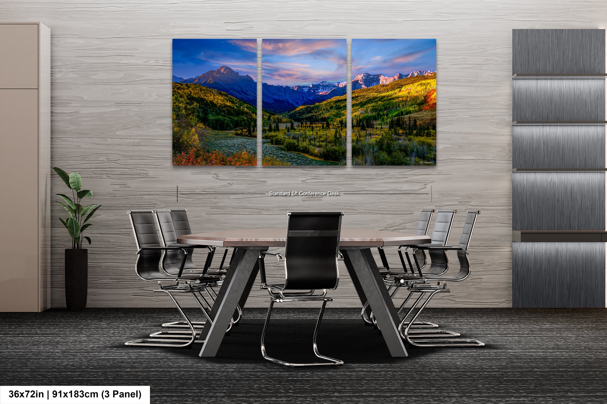 a dining room table with chairs and a painting on the wall