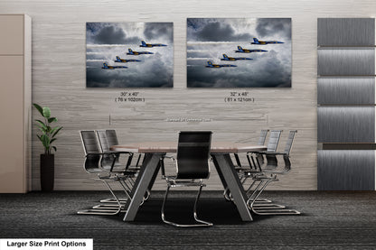 a dining room table with chairs and two pictures of planes